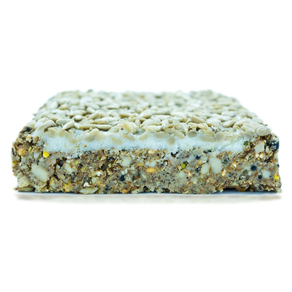 Seeded energy cake on a white background
