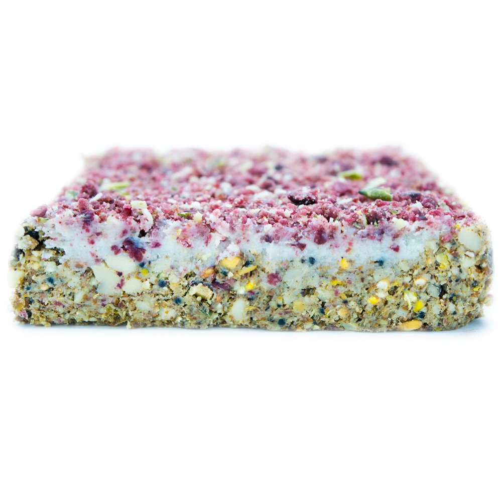 Berry energy cake form winstons wilds with fruit pieces on a white background