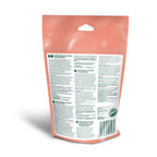 Back view of a pink package with text and a barcode on a white background