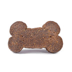 Dog bone-shaped treat on a white background