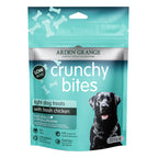 A 225g stand-up pouch of Arden Grange Crunchy Bites light dog treats with fresh chicken. The packaging is teal with white text and bone graphics, featuring a black Labrador dog on the front.