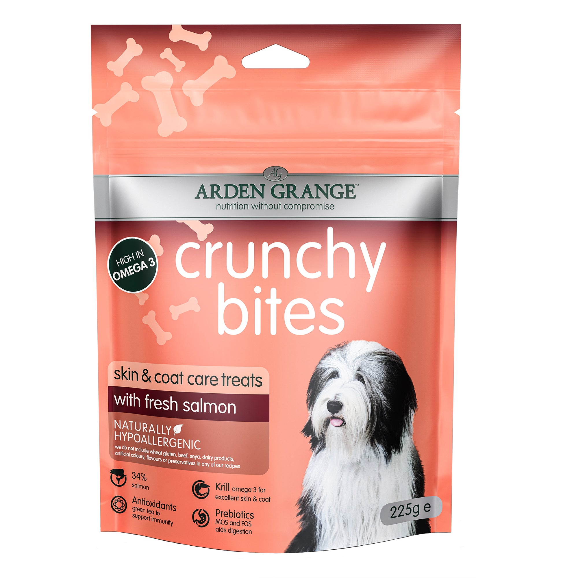 A package of Arden Grange Crunchy Bites skin and coat care treats with fresh salmon, featuring a salmon-colored pouch with a picture of a black and white dog.