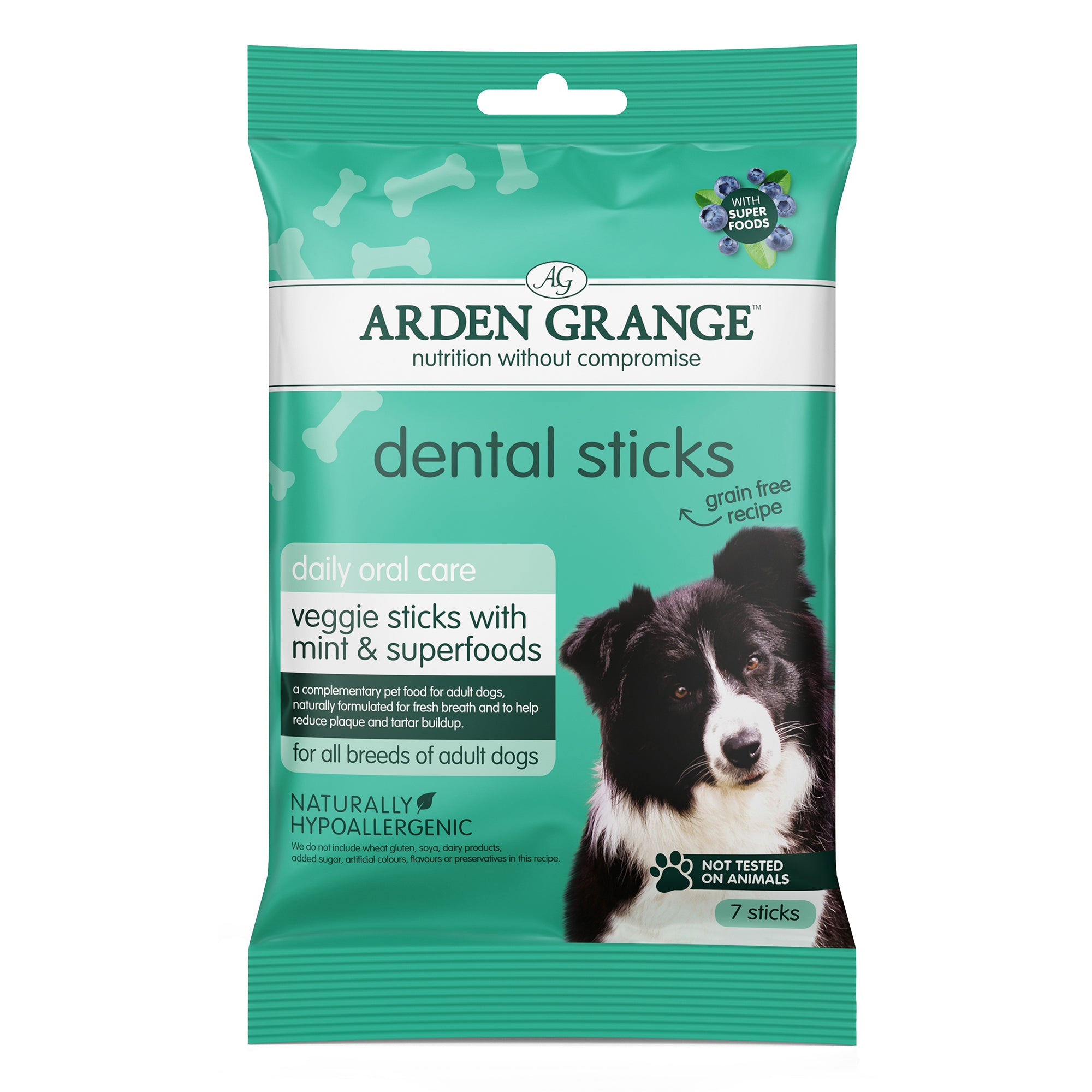 A package of Arden Grange Dental Sticks veggie sticks for adult dogs, featuring a teal and white bag with a photo of a black and white dog on the front.