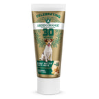 A tube of Arden Grange Celebrating 30 Years Peanut Butter Paste dog dental treat, featuring a brown and green label with a dog illustration, on a white background.