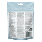Back view of a light blue stand-up pouch package with a large white information panel, barcode, and guarantee seal on a plain white background.