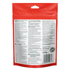 Back view of a red stand-up resealable pouch package with a large white information panel, barcode, and a circular 'Barefoot' seal, photographed on a plain white background.