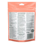 The back of a salmon fish food pouch, showing detailed text in multiple languages, a barcode, and a circular 'Furnished' quality stamp on a white background.