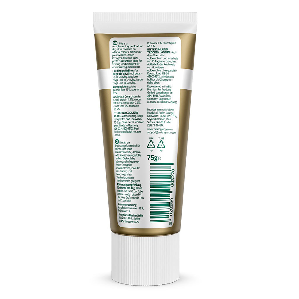 The back of a white squeeze tube with a metallic gold label, showing detailed product information, ingredients, and a barcode on a white background.