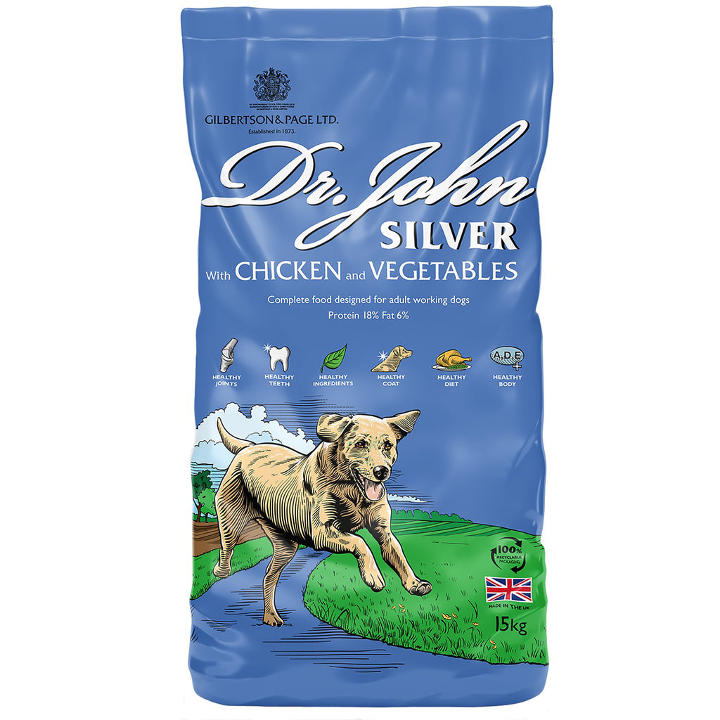 Bag of Dr. John Silver dog food with a blue background and a dog illustration on a grassy area.