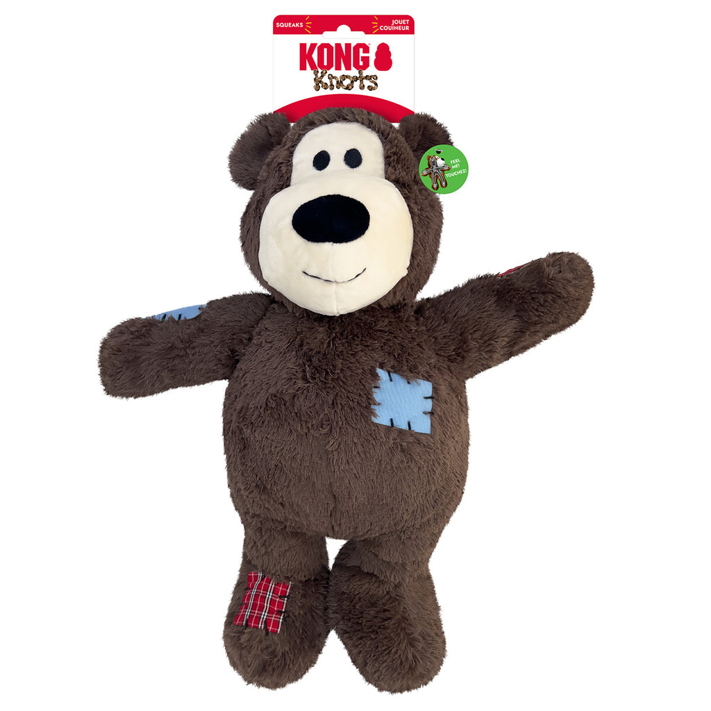Brown plush bear toy with a visible Kong logo on a white background