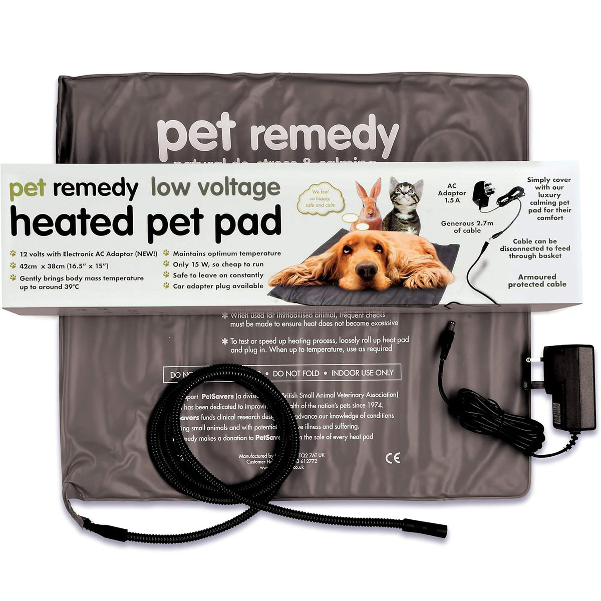 A pet comfort heated pet pad set shown with its gray fabric pad, printed product information card, black power cord, and AC adapter on a white background.
