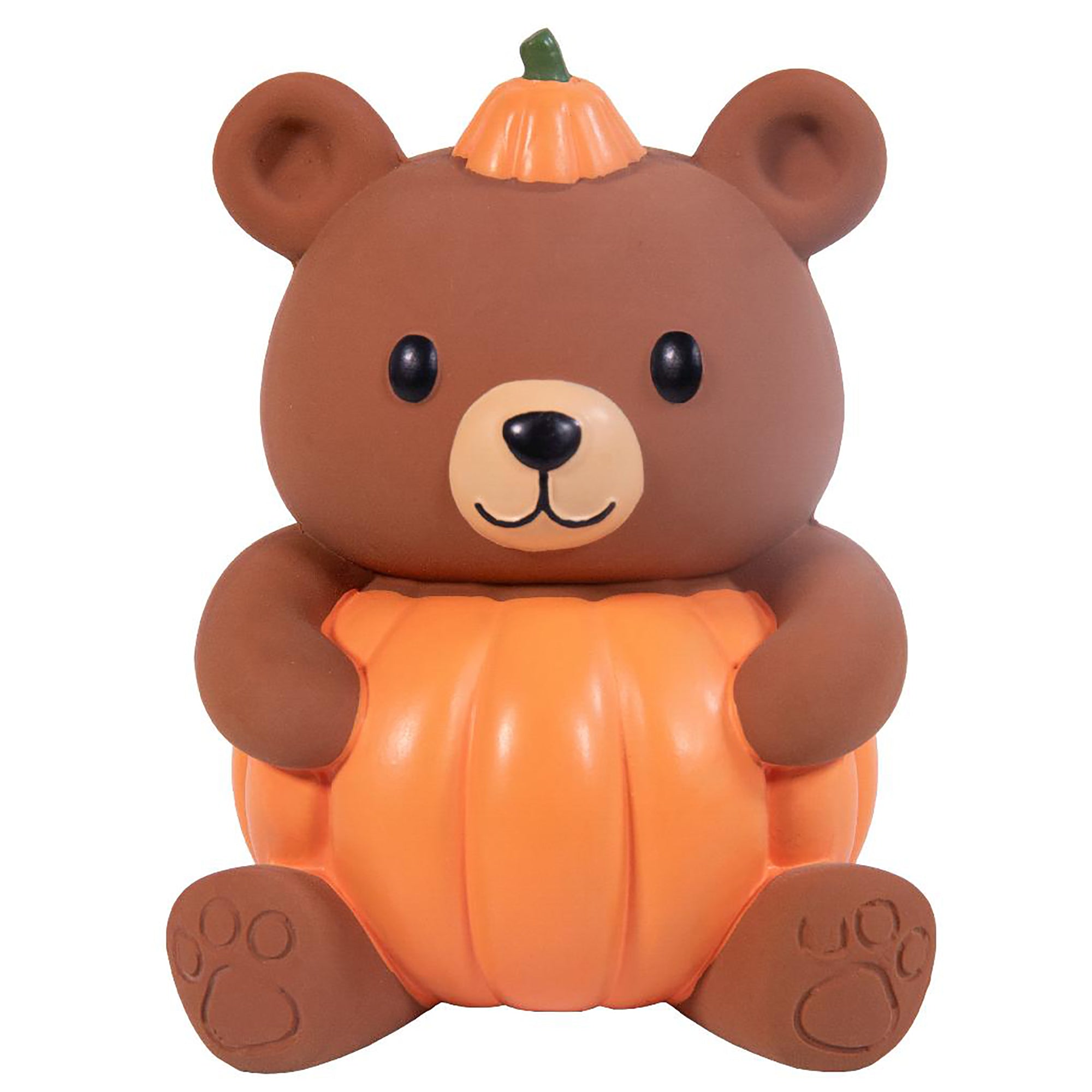 A brown teddy bear toy holding an orange pumpkin, with a small orange pumpkin on its head, shown against a plain white background.
