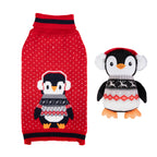 Rosewood Cupid & Comet red Christmas dog jumper with penguin design beside a plush penguin toy