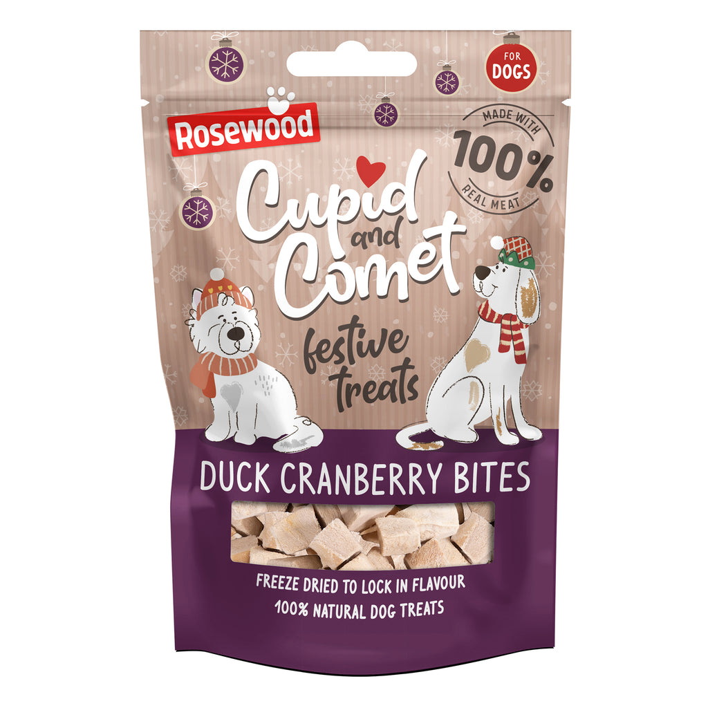 Rosewood Cupid & Comet Freeze-Dried Duck & Cranberry Bites 25g — festive beige and purple packaging with two illustrated dogs wearing Christmas hats and scarves, showing freeze-dried duck bites through a window at the bottom, 100% real meat badge