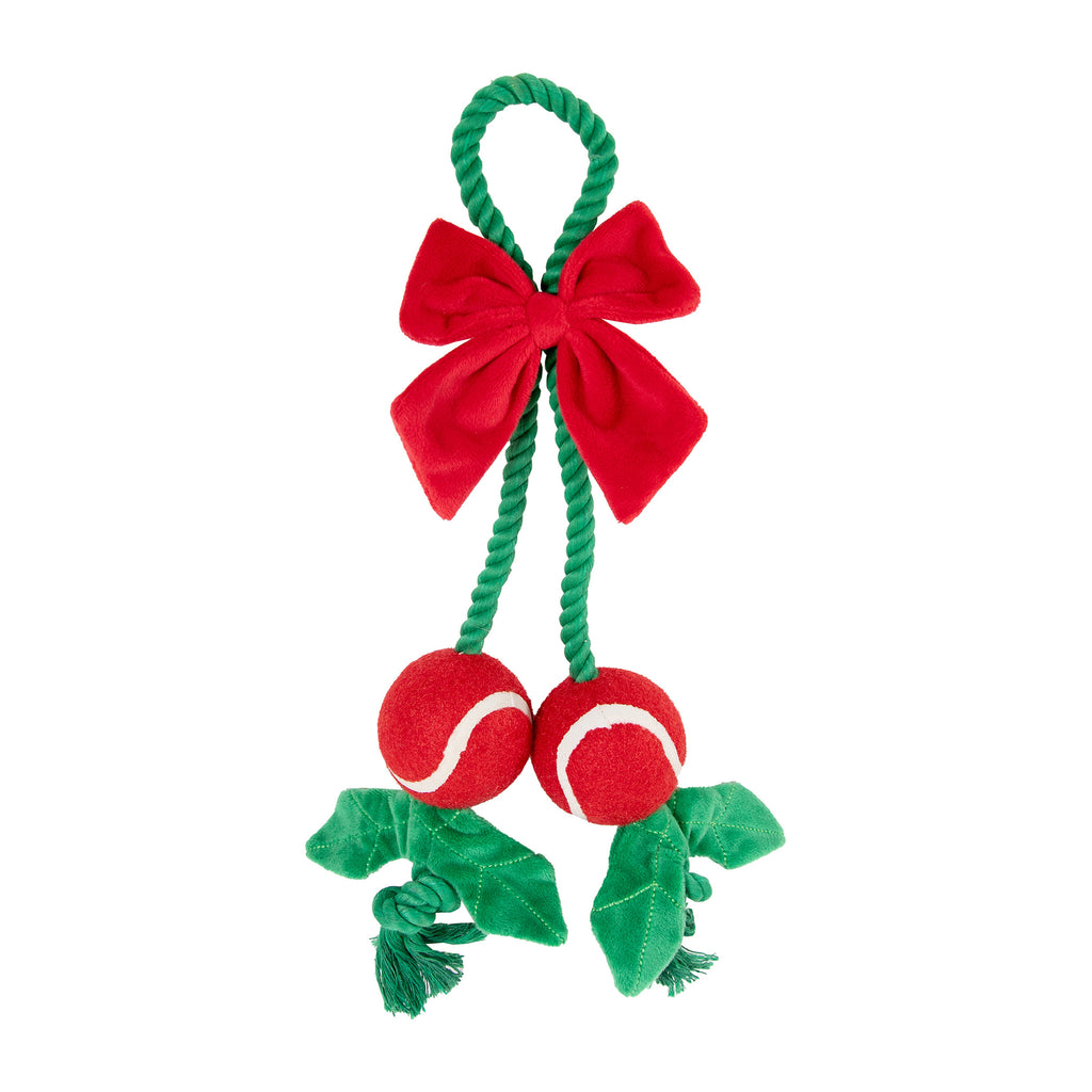 Rosewood Holly Jolly Christmas rope dog toy with red bow, two tennis balls and green holly leaves