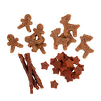 Rosewood Cupid & Comet Meaty Selection Box Dog Treats 175g — close-up of all four treat varieties on a white background: chicken carrot sticks, duck carrot stars, meaty gingerbread men, and meaty reindeer shapes