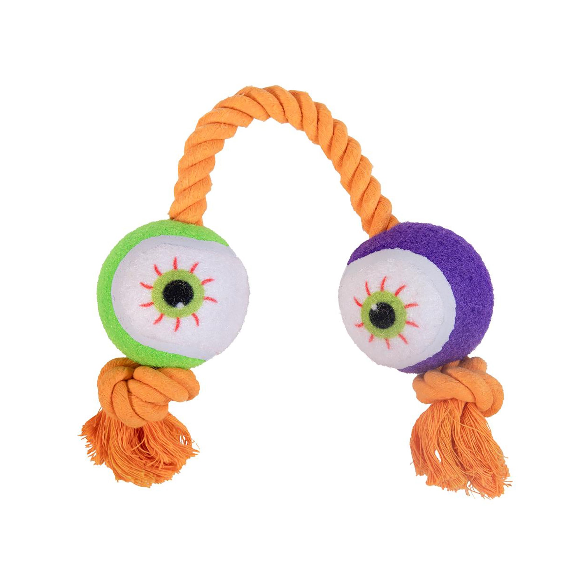 An orange rope dog toy with two tennis ball eyeball ends, one green and one purple, on a plain white background.